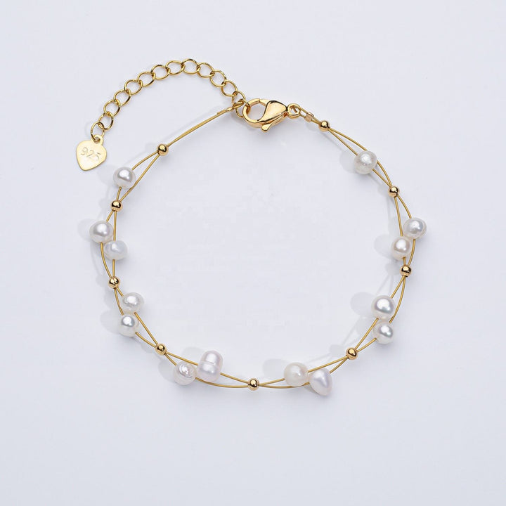 AURO | Bracelet with subtle pearl accents