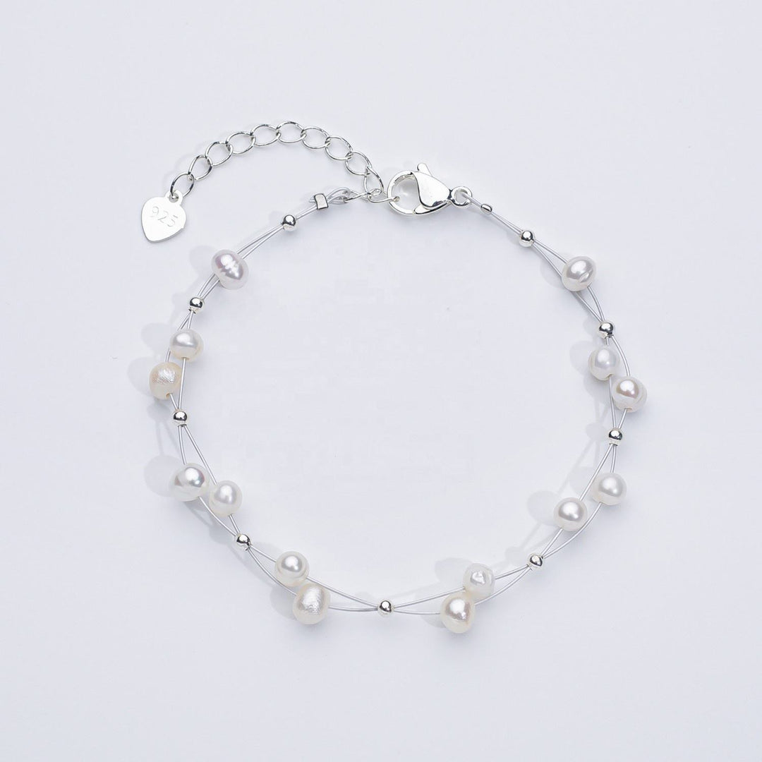AURO | Bracelet with subtle pearl accents
